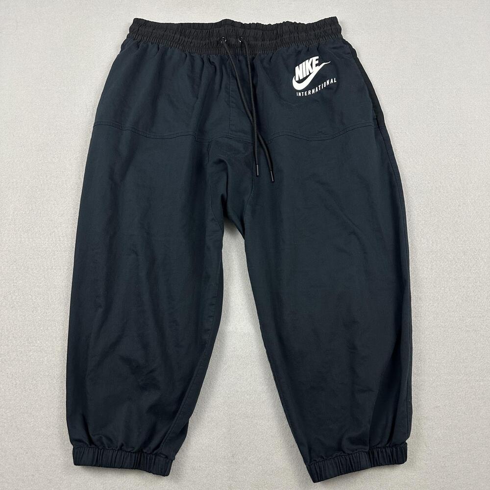 Nike International Pants Women Large Black Woven Joggers Elastic Waist Cuffed L